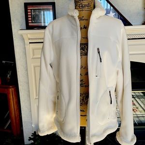 Never worn beautiful white jacket with Faux fur lining